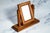 This elegant early 20th century tabletop picture frame is a beautifully crafted decorative object that blends refined...