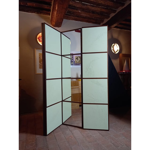 Green divider by Pietro Meccani, 1993. Screen made up of three elements, one with mirrors; Made of dark wood with...