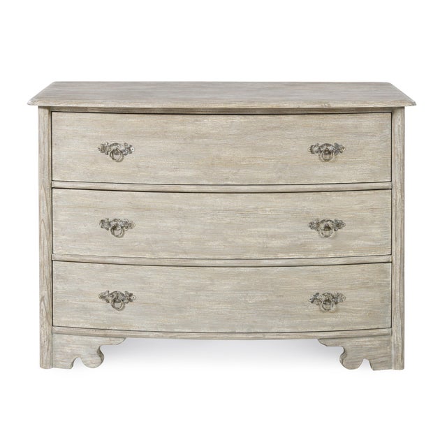 The 19th-century inspired Swedish commode in a scraped cream finish embodies the Gustavian style, which is characterized...