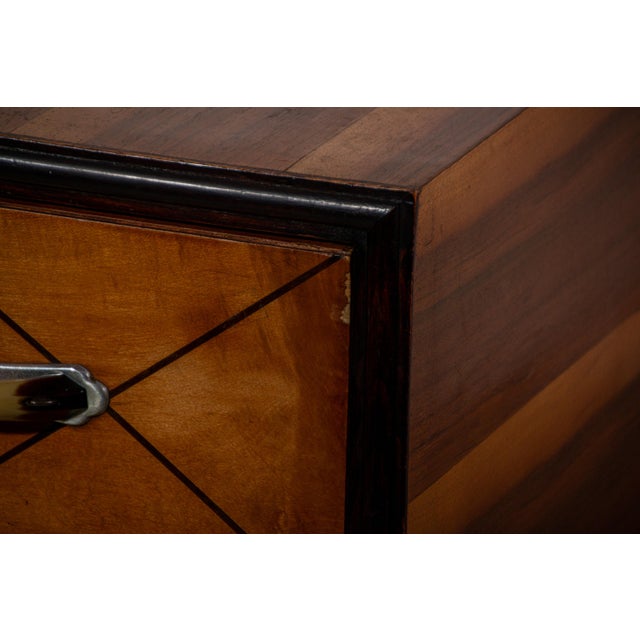 Chest of Drawers made in Italy in the 1940s with faux animal bone drawer handles. The cabinet is made from a teak veneer.