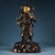 A commanding solid-copper statue of a standing Guardian King (Tianwang / 天王), masterfully executed in fine high-relief...