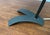 Mid-century table lamp with a crow's foot base. The shade is made of folded sheet metal, resulting in its distinctive...