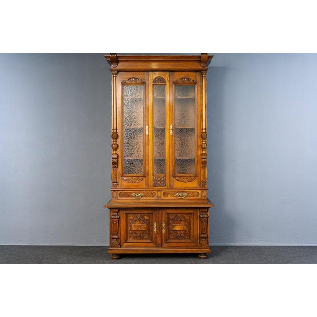 Object: Two-door bookcase Period & Style: Gründerzeit - second half of the 19th century Features: - Elegant and practical...