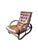 Bamboo-rattan lounge chair with an original cognac-colored leather tufted cushion. It is designed in the style of Paul T....