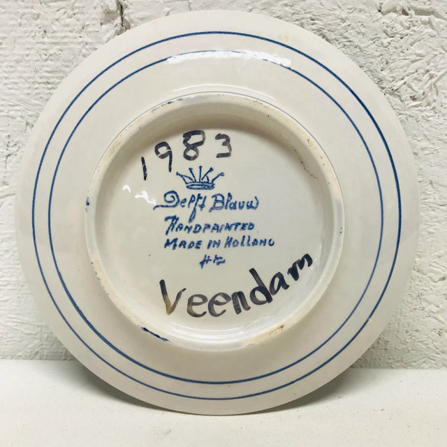 Delft hand painted decorative plate with windmill pattern. See pictures for mark. 7” diameter. No cracks or chips.