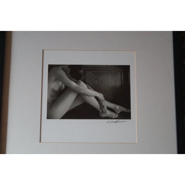 A beautiful black and white photograph of a well positioned nude. This piece is framed and signed by the artist. This was...