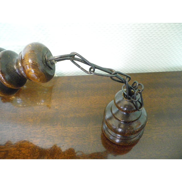 Three-Light Pendant Lamp in Varnished Turned Wood with Amber Tulip-Shaped Glass Shades, France, 1970s For Sale - Image 17 of 18