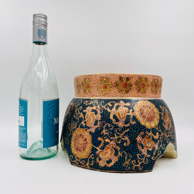 Vintage Satsuma‑Style Ceramic Stand / Riser This vintage Satsuma‑style ceramic stand is a richly decorative piece,...