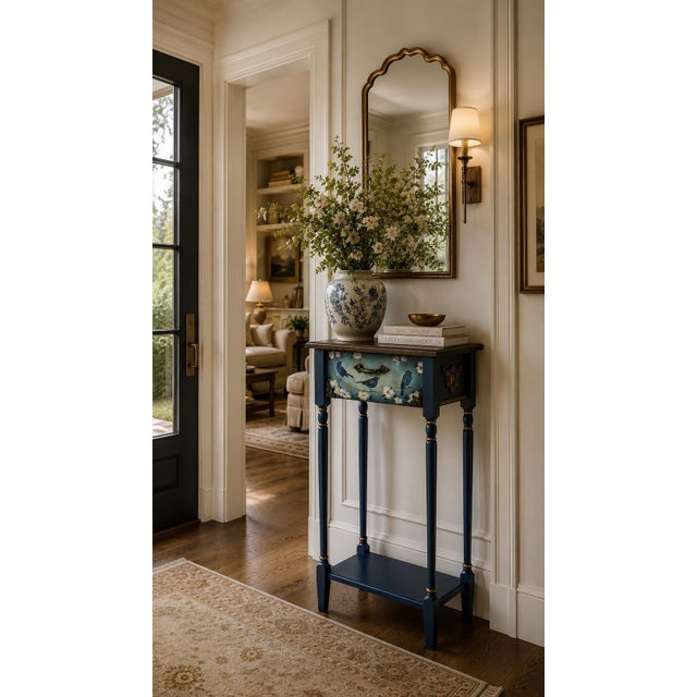 Bring a quiet, storybook elegance to your space with this one-of-a-kind Birds & Gardens accent table — hand-painted,...