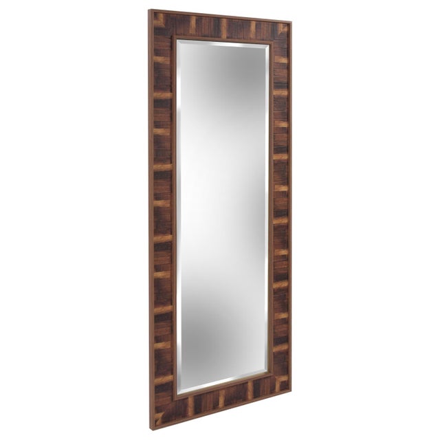 Rich wood tones are captured in the faux inlaid design of the Woodland mirror. The versatility of this mirror makes it an...