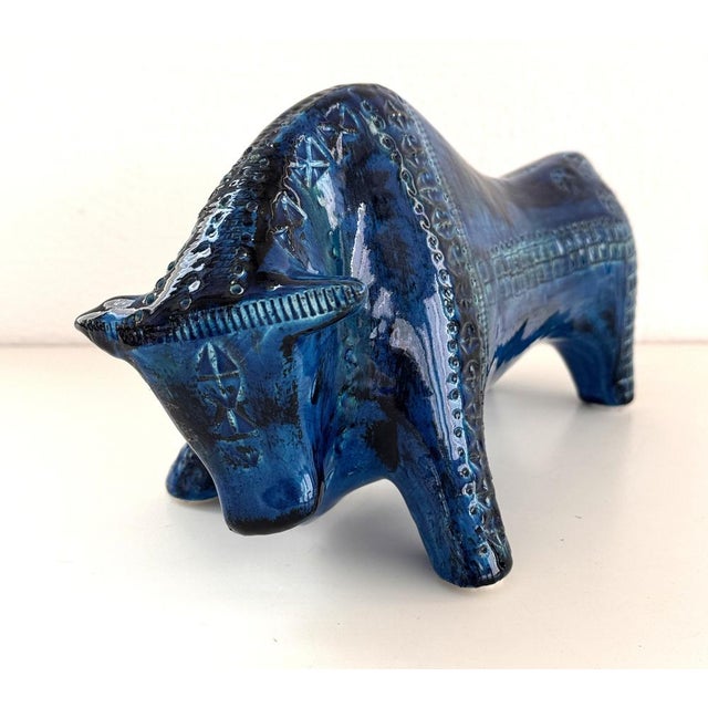 Beautiful bull made of ceramic and painted in "Rimini blue" color, designed by Aldo Londi for Bitossi in the 1960s. Very...