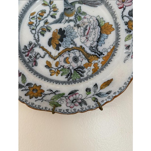 Antique Ashworth Bros Hanley England ironstone plate with crown and banner backstamp, likely produced in the late 19th to...