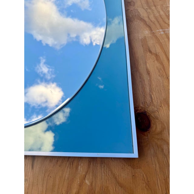 Striking vintage modern designer mirror by Knitter, featuring the iconic “Duro” frame. This elegant oval mirror is framed...