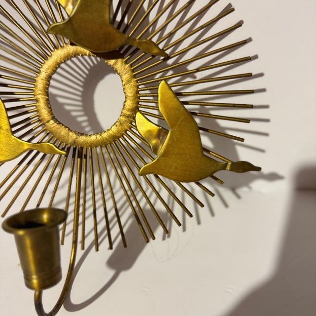Sexton style metal wall sconce in the manner of Curtis Jere. Some wings show a small crease where the wing might have...