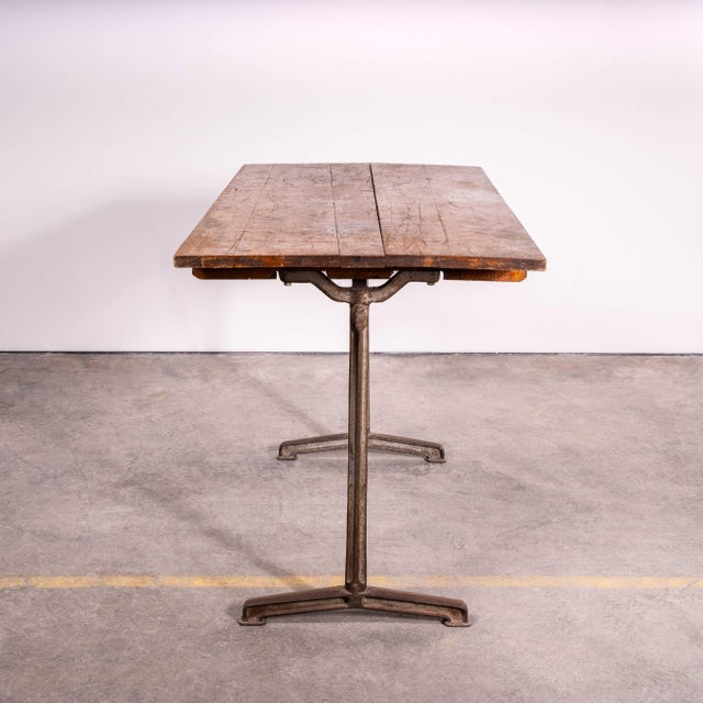 1930’s Original Cast Base Fischel Bistro Dining Table. Fischel was founded in 1871 by Czech born David Gabriel Fischel, a...