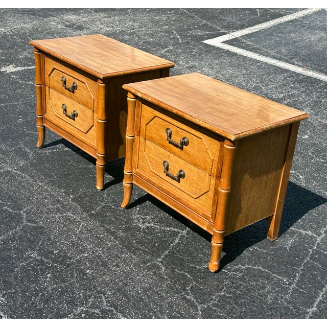 Vintage faux bamboo pair of nightstands by Broyhill. Wood grain finish laminate top matching the warm tone wood finish on...
