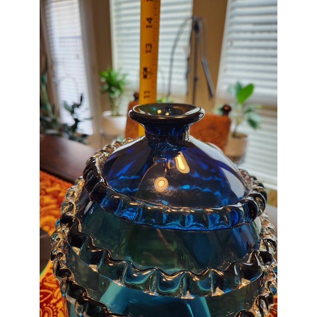 Elevate your space with this magnificent, monumental mid-century modern art glass vase attributed to the legendary Murano...