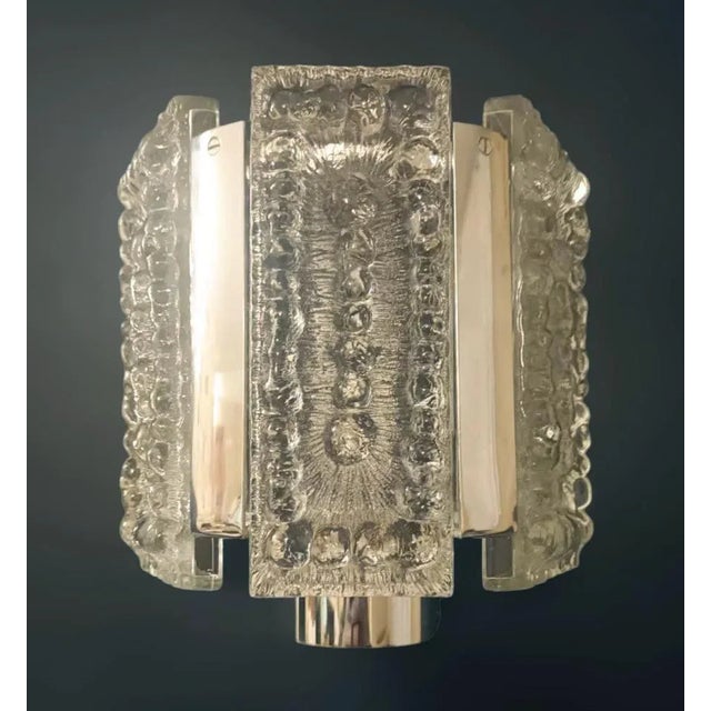 Italian modernist wall lights with clear textured Murano glass panels mounted on chrome frames / Made in Italy circa 1960s...