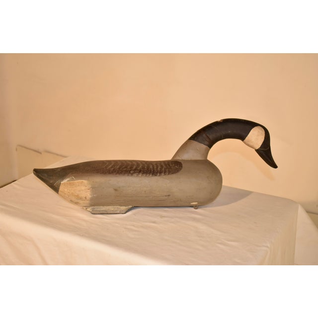 Original hand carved and painted Canadian Goose decoy from the area of Havre de Grace in Maryland. This piece came out of...