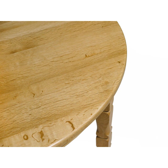 Beautiful Danish dining table designed by Henning Kjaernulf Denmark, 1960s. Handcrafted from solid white oak, the table...