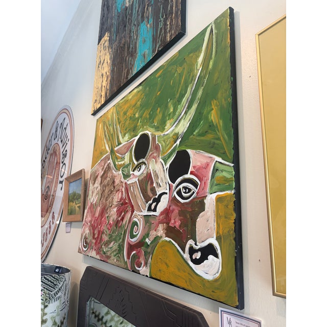 This abstract painting by Leon Collins features two horned cattle. Leon collins was a self taught folk artist known for...