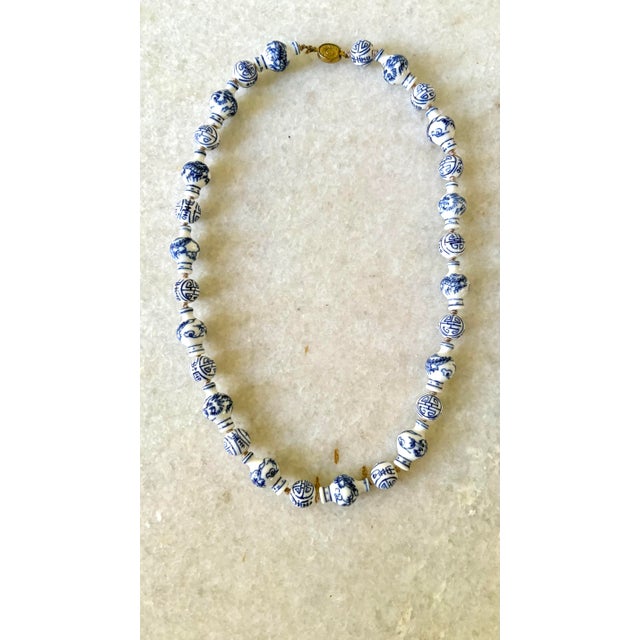 Vintage Chinese blue and white porcelain Shou symbol bead necklace, typically dating from the mid-20th century (circa...
