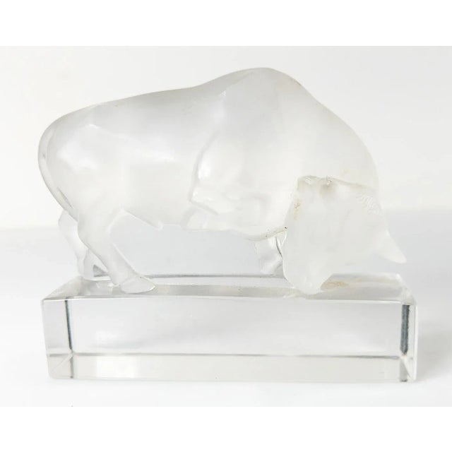 We are selling this vintage mid-century French frosted glass figure of a raging bull by Lalique with acid signature....