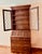 Offered is a vintage traditional Ethan Allen Secretary in heavy grained oak with beautiful carved panels on the drop down...