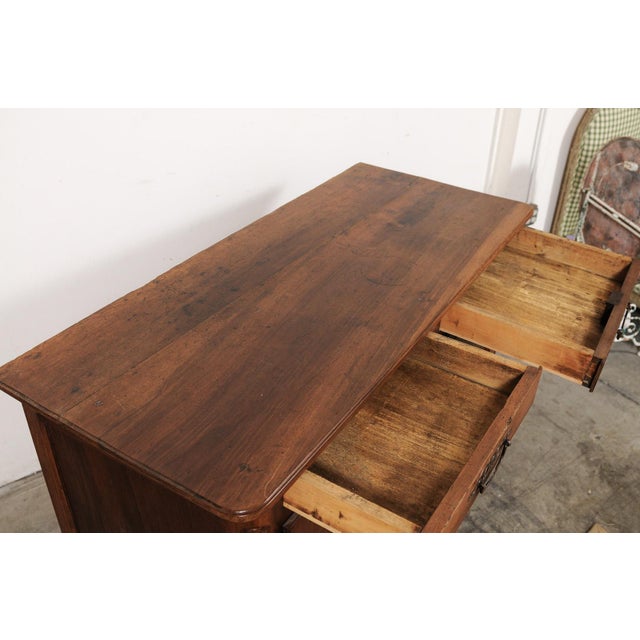 Rich in provincial French charm, this handsome 19th-century buffet is crafted from warm walnut and showcases the timeless...