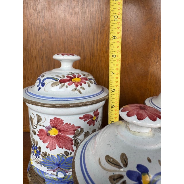 White Vintage Hand-Painted Faience Floral Ceramic Canister Set – European Country Kitchen Storage (Set of 3) For Sale - Image 8 of 12