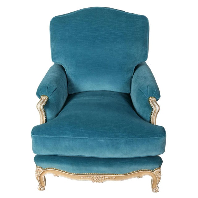 A pair of vintage Jansen style newly upholstered velvet chairs. The pair of bergeres in Louis XV style feature sumptuous...