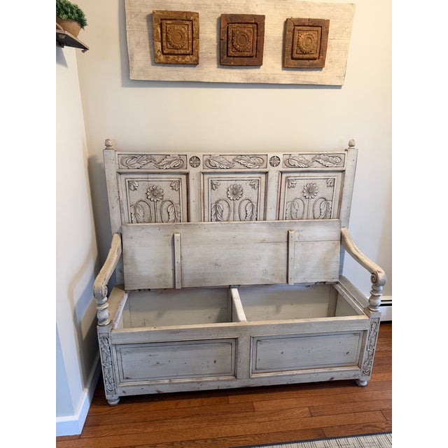 This Tall-backed French Country carved settee/bench is a boutique furniture statement piece with a soft, intentionally...