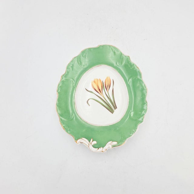 3 heart shaped late Regency - early Victorian dessert service plates, England circa 1830. The center panel depicts a...
