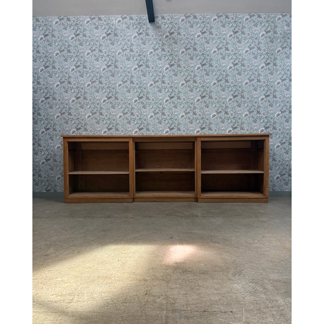 A vintage 1950s workbench, this large open oak cabinet impresses with its clean lines and beautiful blond hue. Both...