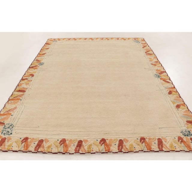 Hand-knotted in premium wool, this contemporary 9x12 Art Deco rug from India joins Rug & Kilim’s renowned Art Deco...