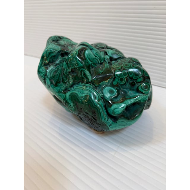 Design Plus Gallery presents a Malachite Stone Specimen. The solid freeform of bulls eye Malachite likely from The...