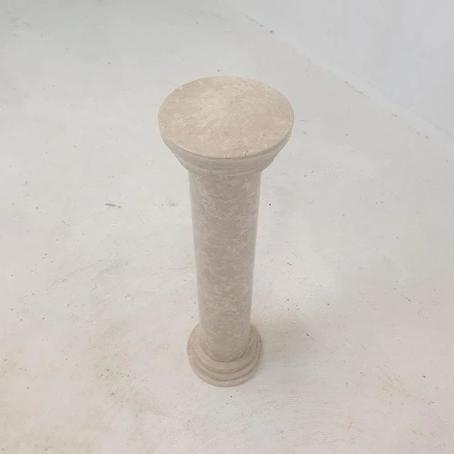 Italian pedestal or side table, handcrafted out of travertine, fabricated in the 80s. It can be used inside or outside the...
