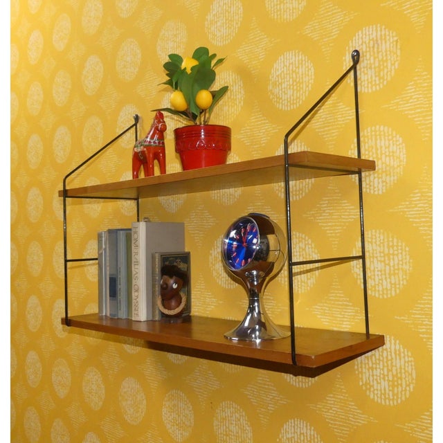 An absolute classic! Simple, Swedish design Design classic This shelf is a reproduction of the famous design by Nisse...