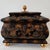 The Maitland Smith Ornate Hinged Mahogany Box with Brass Ball Feet & Finial is a large, rectangle-shaped decorative box...