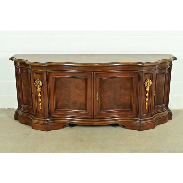 A gorgeous French Regency Louis XVI style serpentine front sideboard buffet, credenza, or bar cabinet By Karges Furniture...
