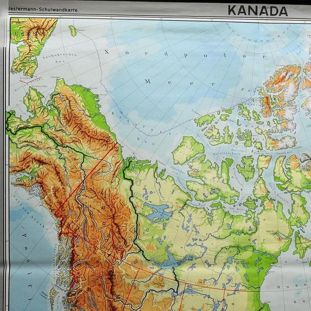A classical pull-down map of Canada and Greenland (North American Continent). Used as teaching material in German schools....