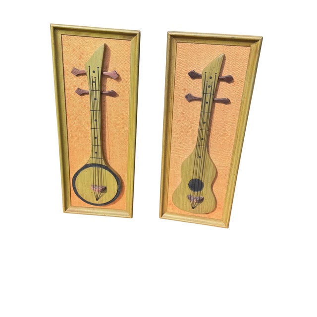 Mid century modern faux musical instruments wall decor. Made from wood and framed. The pair would look great in a music...