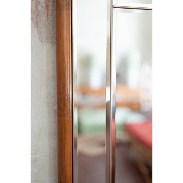 Bamboo and Beveled Glass Mirror – 1970s Made with natural bamboo structure and leather bindings. Geometric composition...