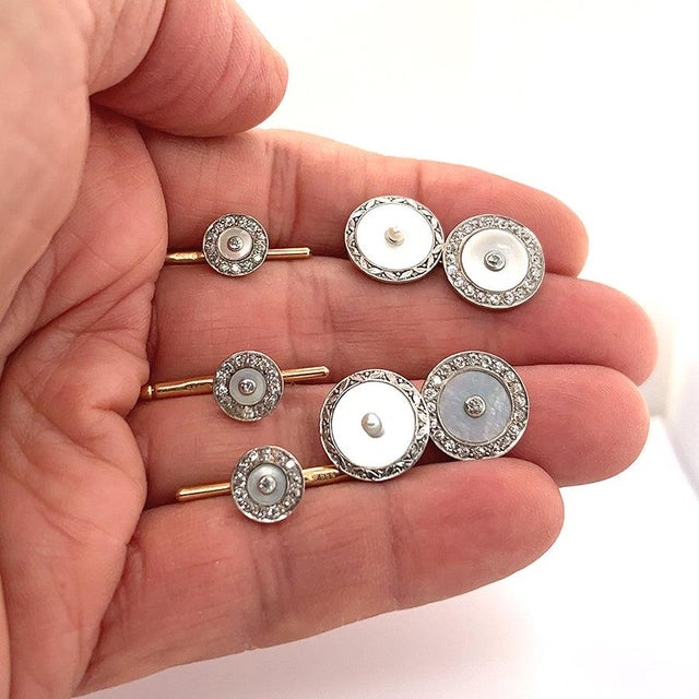 Platinum & 14k Mens Mother of Pearl and diamond dress set (cufflinks and three studs) set with 82 round diamonds weighing...