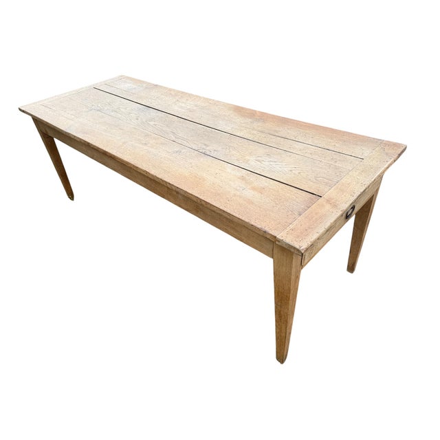 Magnificent and large solid oak farmhouse table, French craftsmanship. Two drawers. Circa 1900. Height under the crossbar:...