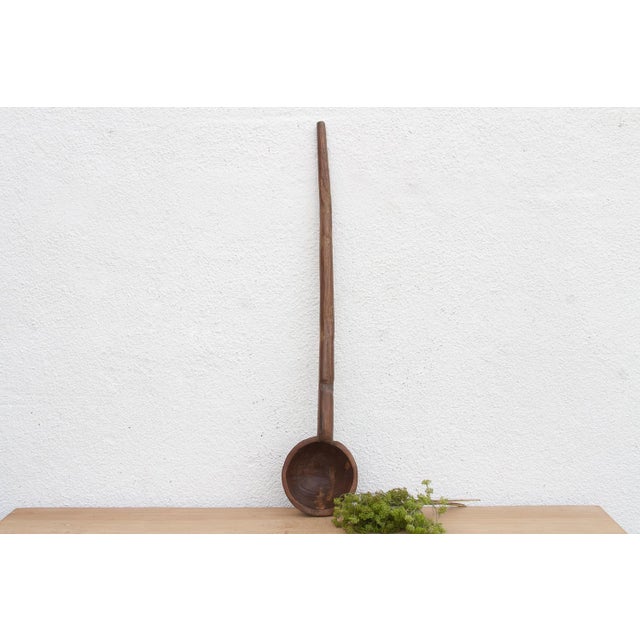 There is something deeply soulful about a simple wooden spoon—especially one carved by hand to feed a village. This...