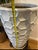 Overscale and highly sculptural, this tall ceramic planter features a bold honeycomb relief pattern that creates depth,...