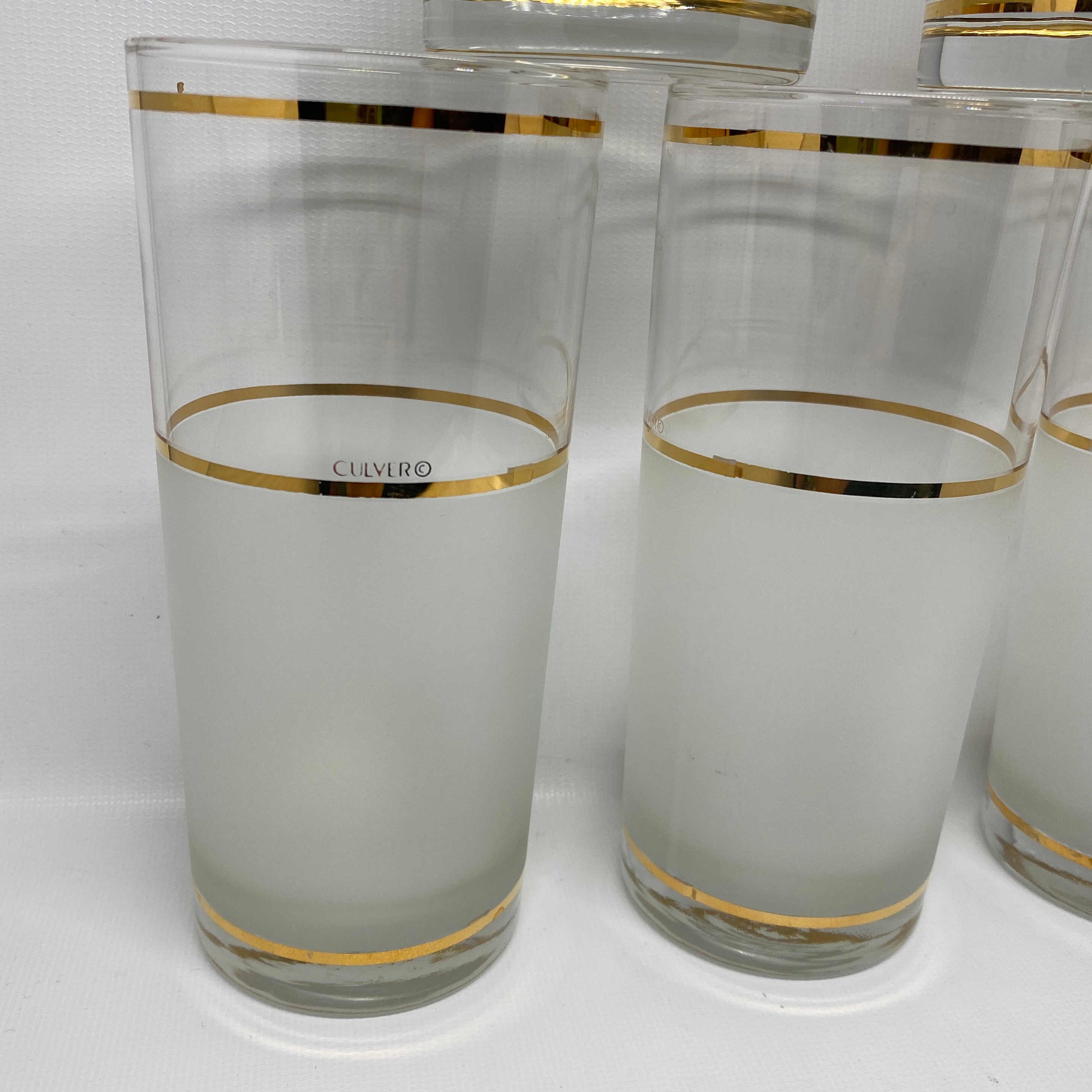 clear glasses with gold trim