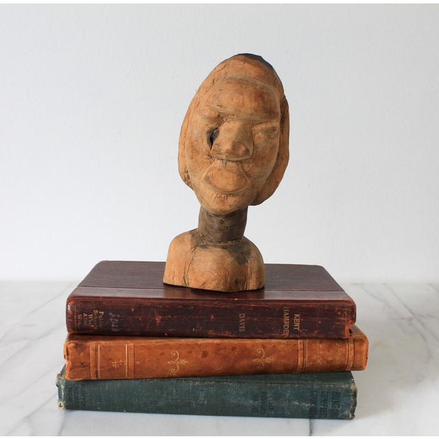 Vintage hand carved African wood bust. No maker mark. Minor age wear.
