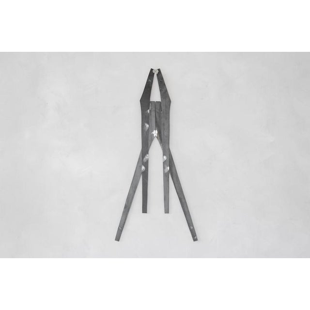 Signes Crossed Wall Sculpture in Natural Steel by Jean-Baptiste Van Den Heede Dimensions: D 1 x W 45 x H 100 cm Materials:...